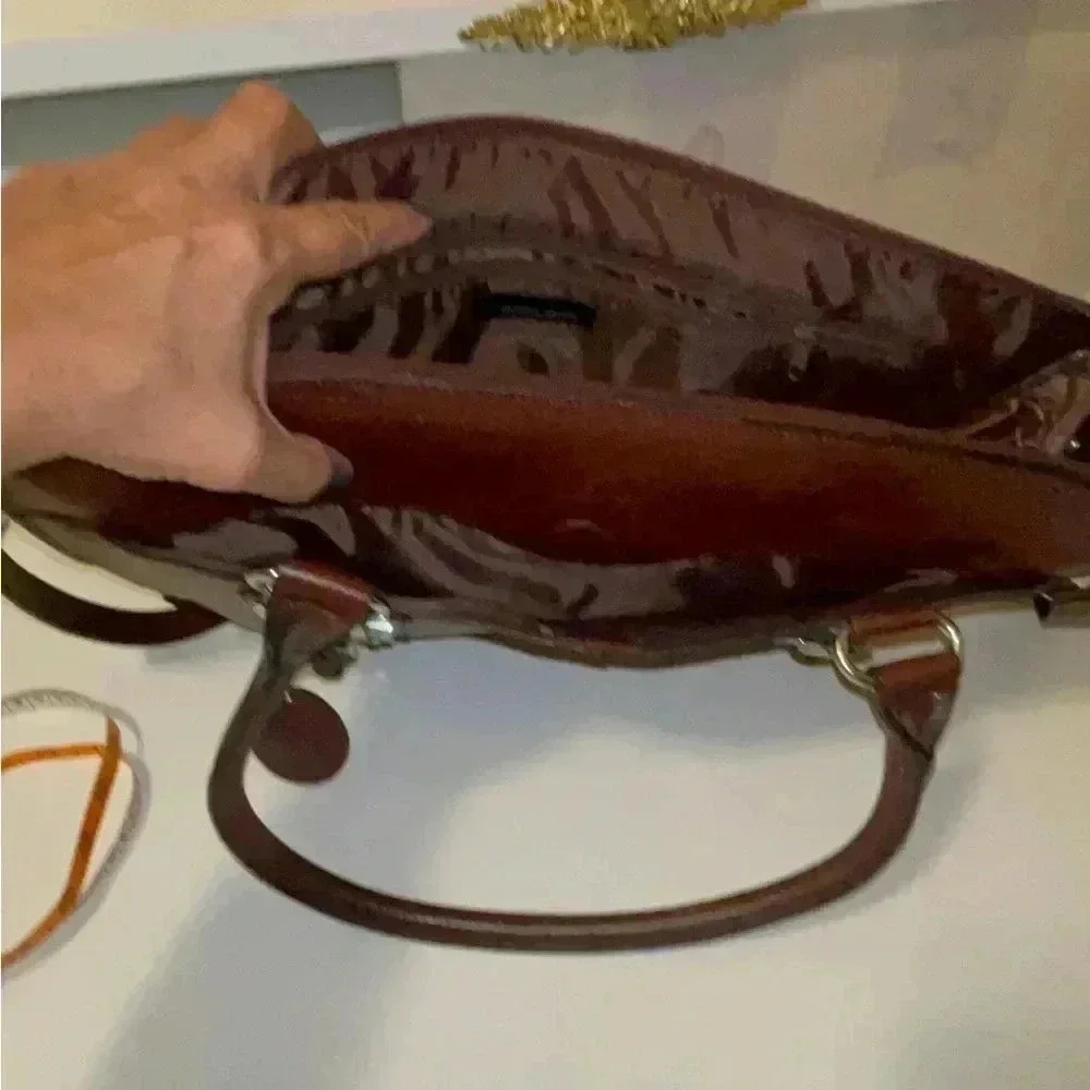 Wilson leather original back, rown color great conditions with adjstbel strap